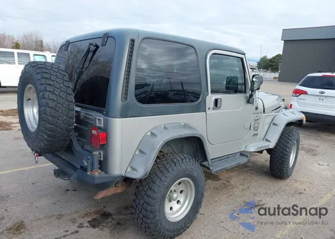2000 Jeep Wrangler Sport z USA, uszkodzony, nr VIN 1J4FA49S2YP797321